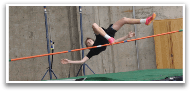 A man is jumping over a bar in a gym, attempting to clear it. AI generated content