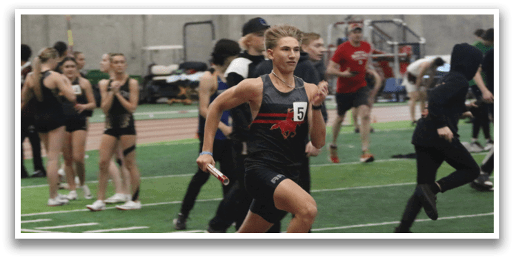 A group of people are running on a track, with one person leading the pack. AI generated content
