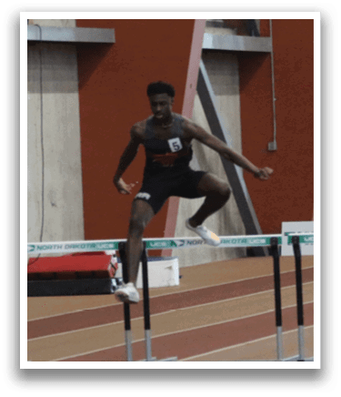A man is running on a track, jumping over a hurdle. AI generated content
