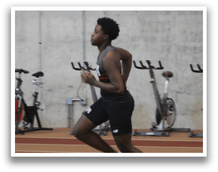 A man is running on a track in front of several bicycles. AI generated content