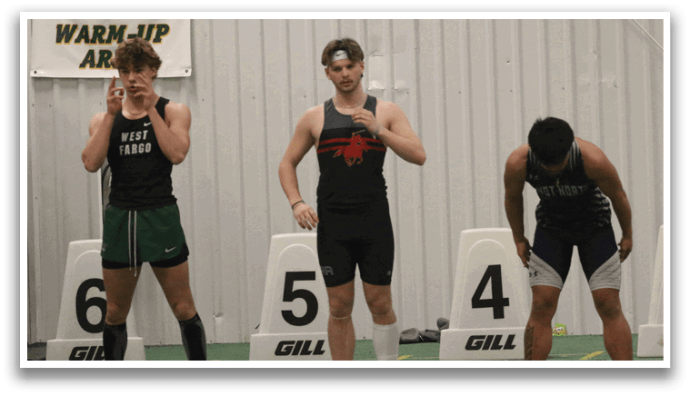 Three men wearing shorts and shirts are standing in a line. Description generated by AI
