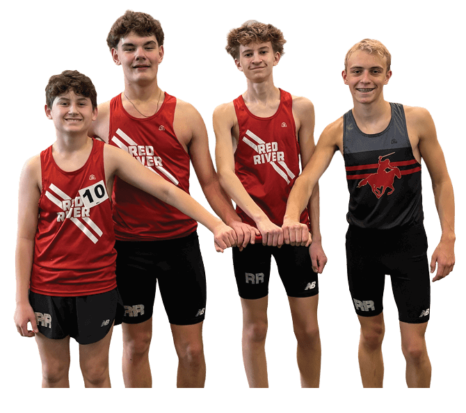 Three boys wearing red and black shirts. Description generated by AI