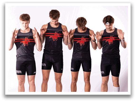 Four men wearing black and red shirts and shorts. Description generated by AI