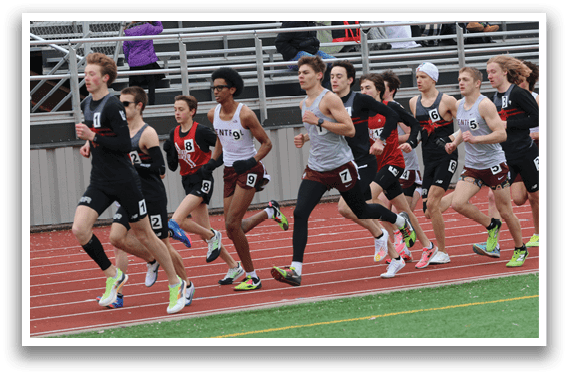 A group of runners on a track. Description generated by AI