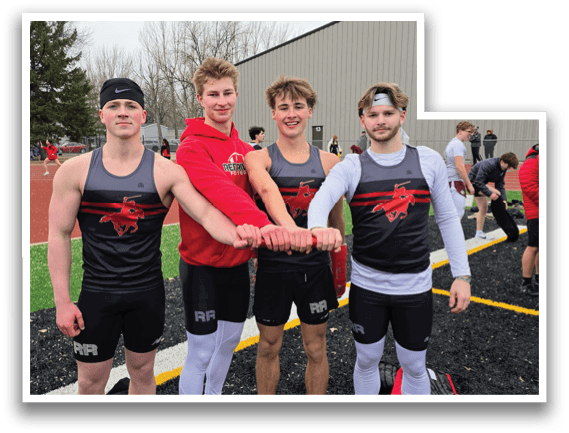 Four men wearing black and red shirts and white socks. Description generated by AI