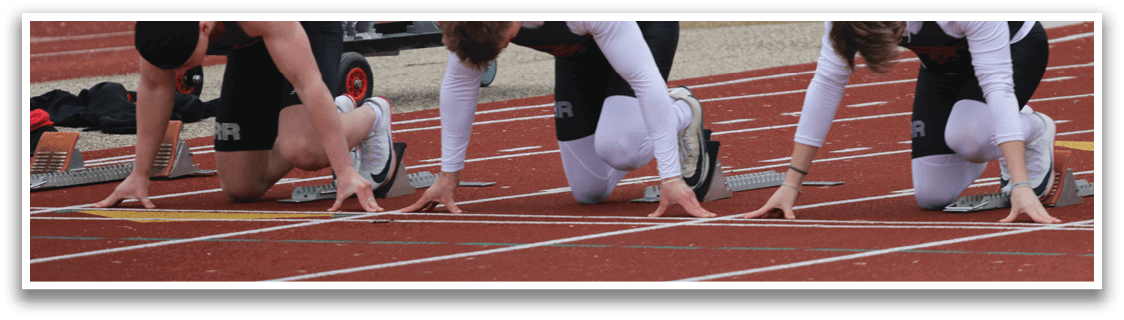 A group of people are running on a track. Description generated by AI
