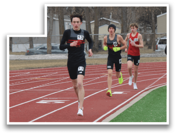 A group of people running on a track. Description generated by AI