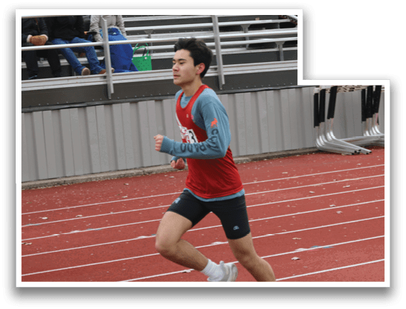 A man running on a track. Description generated by AI