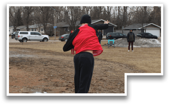 A man is jumping in the air to catch a frisbee. Description generated by AI