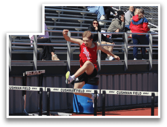 A man is jumping over a hurdle on a track. Description generated by AI
