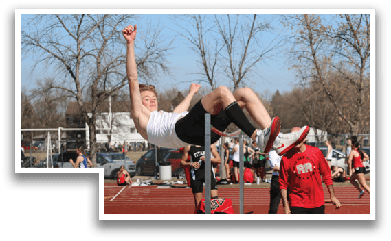 A man is jumping in the air with his arms outstretched. Description generated by AI