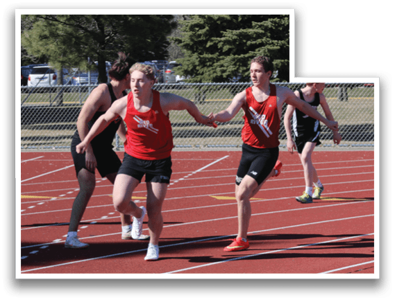 A group of people running on a track. Description generated by AI