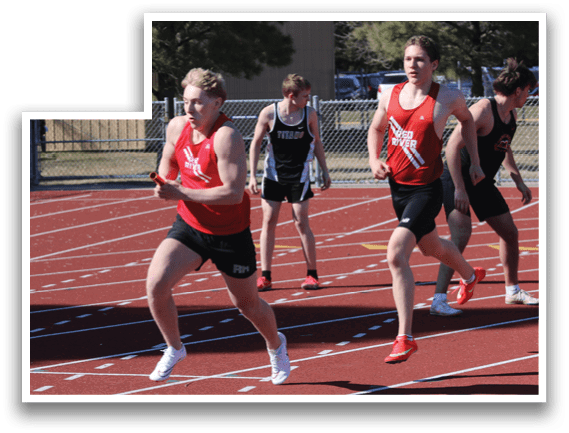 A group of people running on a track. Description generated by AI