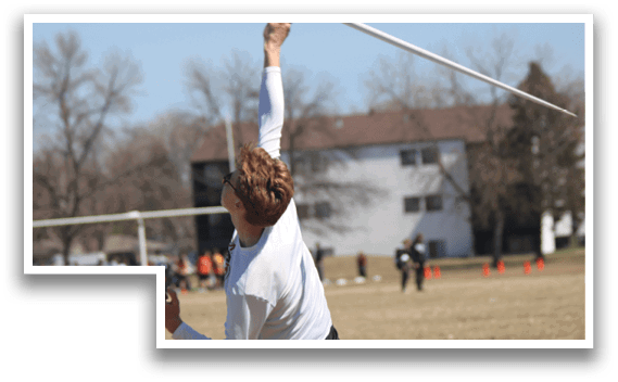 A man in a white shirt and black pants is throwing a frisbee. Description generated by AI