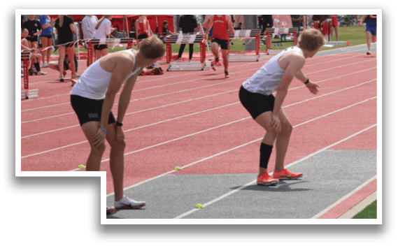 A group of people are running on a track. Description generated by AI
