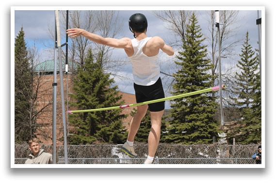 A man is jumping over a pole. Description generated by AI