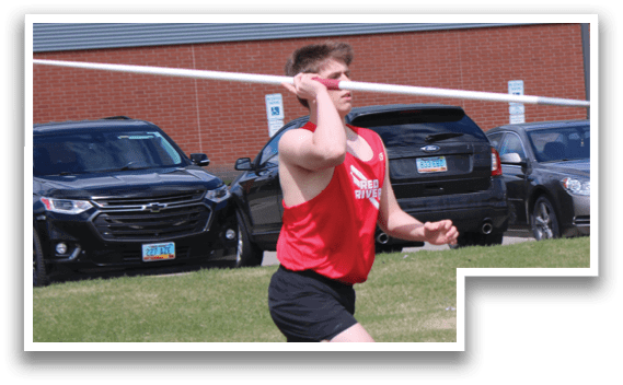 A man is holding a pole and throwing a frisbee. Description generated by AI