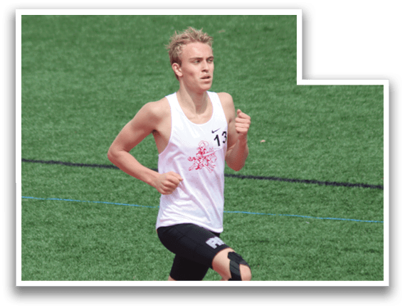 A man running on a track. Description generated by AI