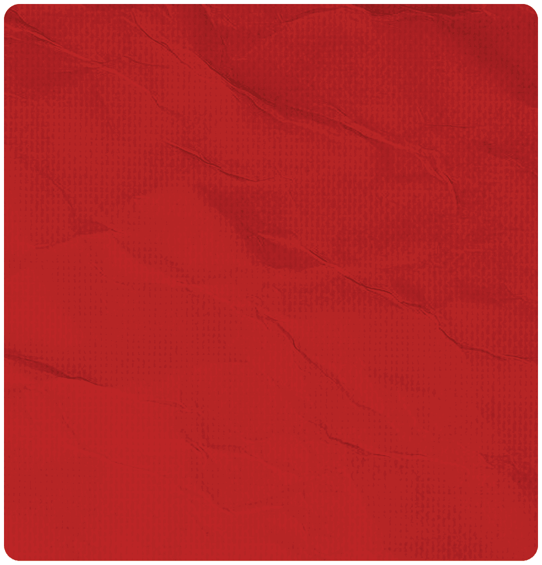 A red piece of paper with a creased edge. Description generated by AI