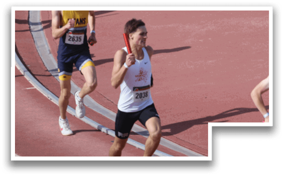 A group of runners on a track. Description generated by AI
