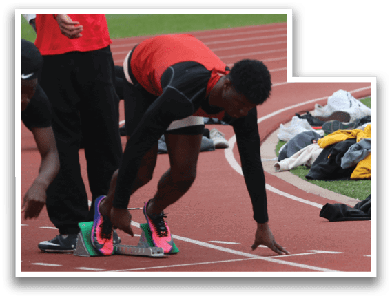 A group of people are lined up on a track. Description generated by AI