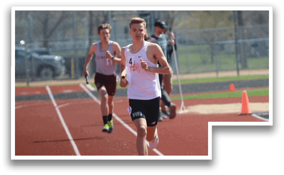 Two men running on a track. Description generated by AI