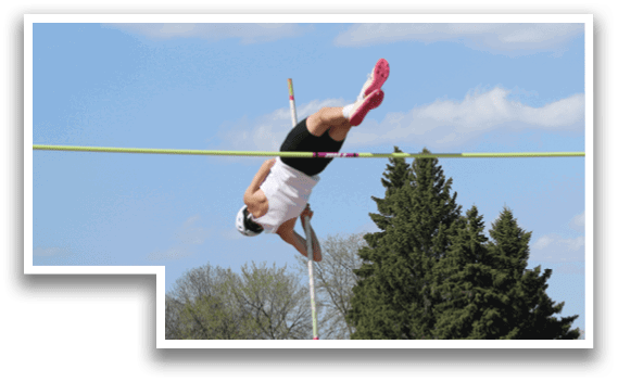 A man is jumping in the air over a pole. Description generated by AI