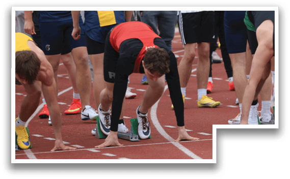A group of people are lined up on a track, wearing shoes and getting ready to run. Description generated by AI