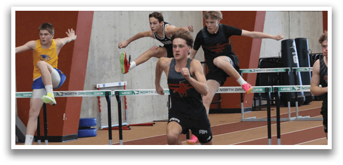 A group of men are jumping over a barrier. Description generated by AI