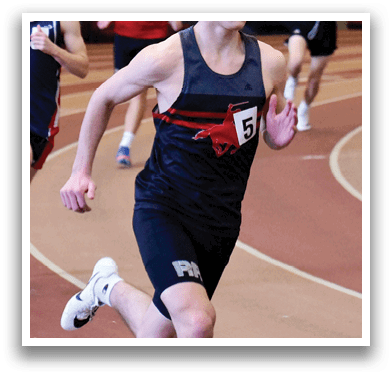 A boy running on a track. Description generated by AI