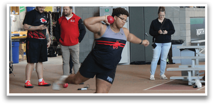 A man is throwing a disc at a target. Description generated by AI