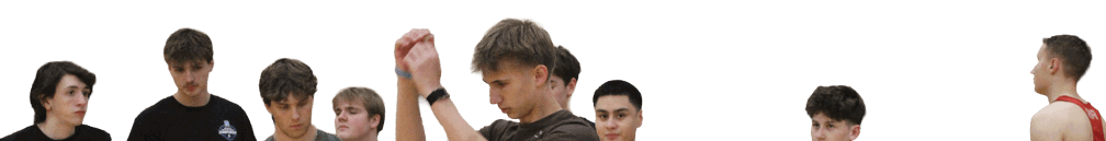 A group of young men are standing in a gym. Description generated by AI