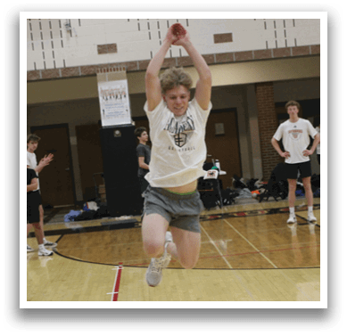 A man is jumping in a gym. Description generated by AI