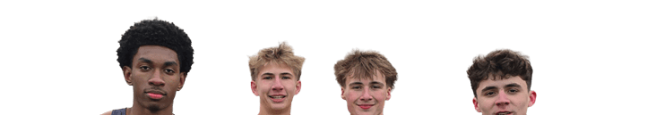 Four young men wearing black and red shirts and shorts. Description generated by AI
