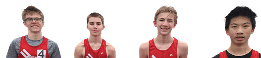 Three boys wearing red shirts and black shorts. Description generated by AI