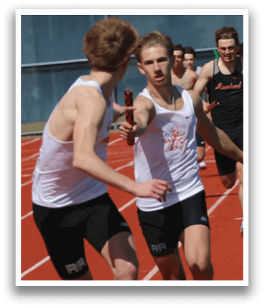 A group of runners on a track. Description generated by AI