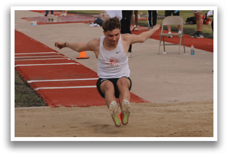 A man is running on a track. Description generated by AI