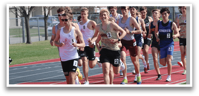 A group of runners on a track. Description generated by AI