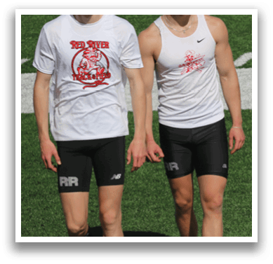 Four men wearing white shirts and black shorts are walking on a field. Description generated by AI