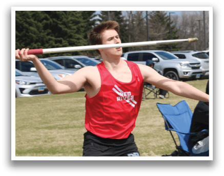 A man is throwing a frisbee in a field. Description generated by AI