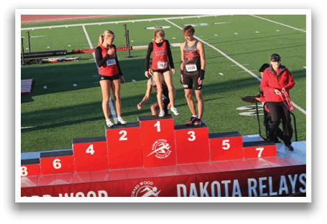 A red sign with the words Dakota Relays on it. Description generated by AI