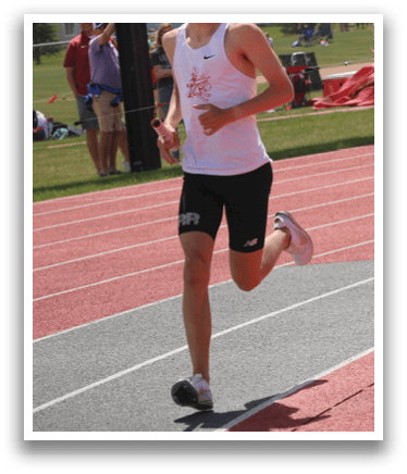 Two men running on a track. Description generated by AI