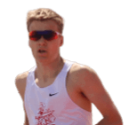 A man running on a track. Description generated by AI