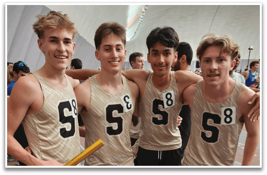 Five male athletes wearing numbered shirts pose for a picture. Contenido generado con IA