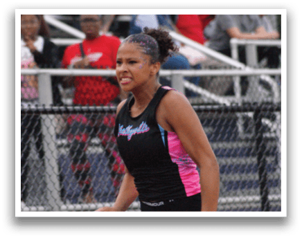 A woman running on a track with a number 5 on her shirt. Contenido generado con IA