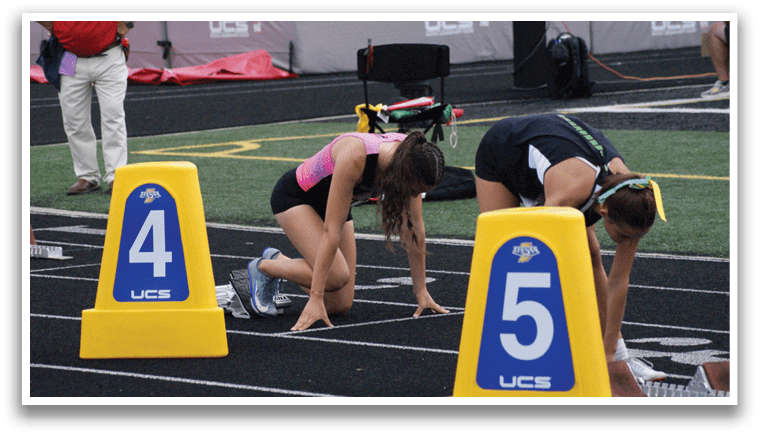 A group of women are running on a track, with some of them wearing shorts. Contenido generado con IA