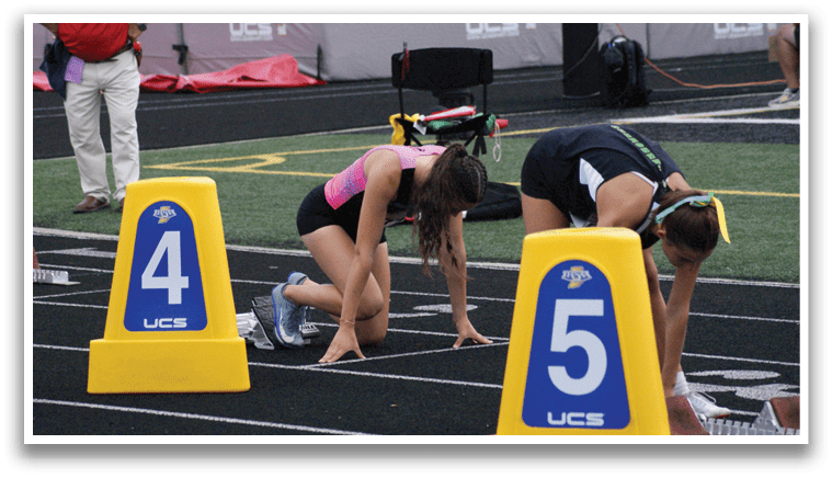 A group of women are running on a track, with some of them wearing shorts. Contenido generado con IA