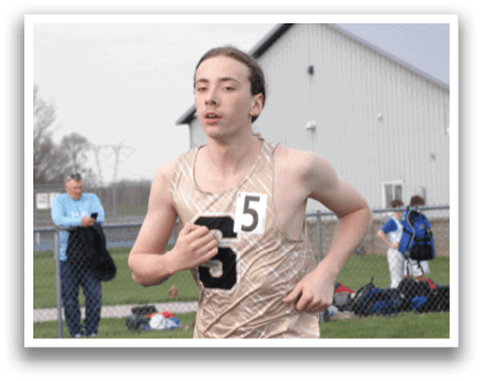 A man is running on a track with a number 5 on his shirt. Contenido generado con IA