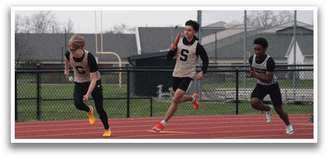 Three people running on a track, one wearing a number 5 shirt. Contenido generado con IA