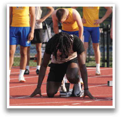 A group of men are lined up on a track, wearing shorts and getting ready to run. Contenido generado con IA